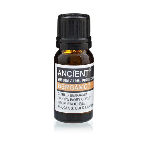 Frasco de cristal ámbar de 10 ml con tapón negro y etiqueta de aceite esencial de bergamota FCF