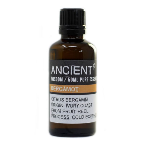 Frasco de cristal ámbar de 50 ml con tapón negro y etiqueta de aceite esencial de bergamota